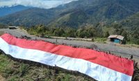 Deklarasi Merah Putih,Satgas Yonif PR 330/Tri Dharma Bentangkan Bendera Raksasa di Sarang OPM.